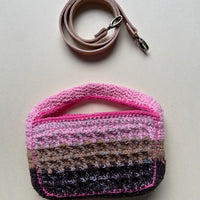Technical crochet Boxy bag by Anabaum shown with its detachable high-end leather shoulder strap on a clean background.