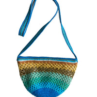 Paris designed Sirena crochet shoulder bag shown on a white background, full front view, rounded shape, turquoise blue and yellow gradient